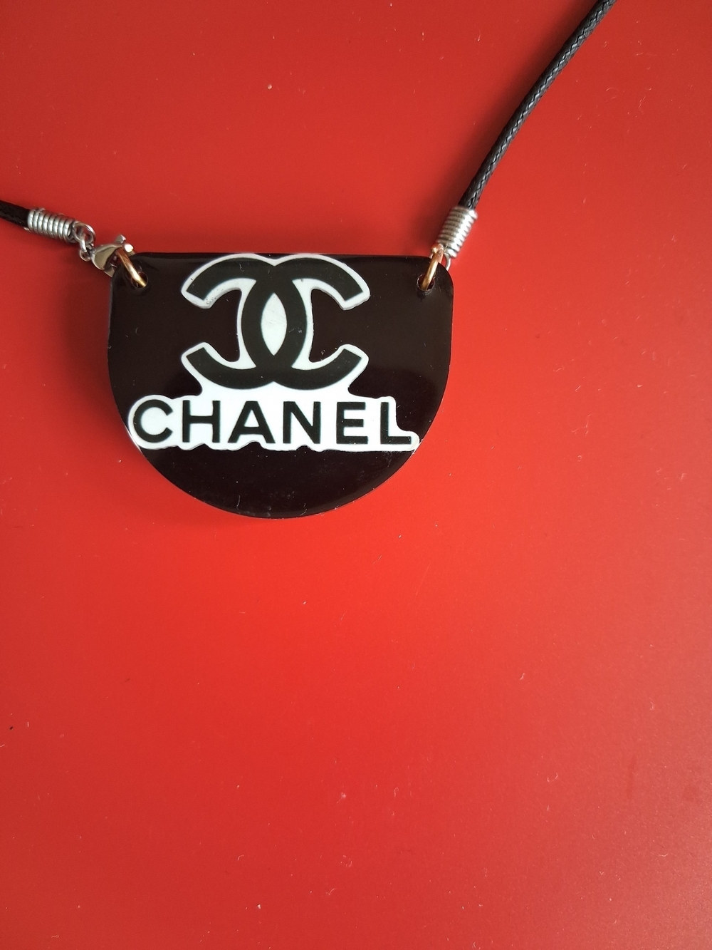 Black and White Logo pendant and rope chain.